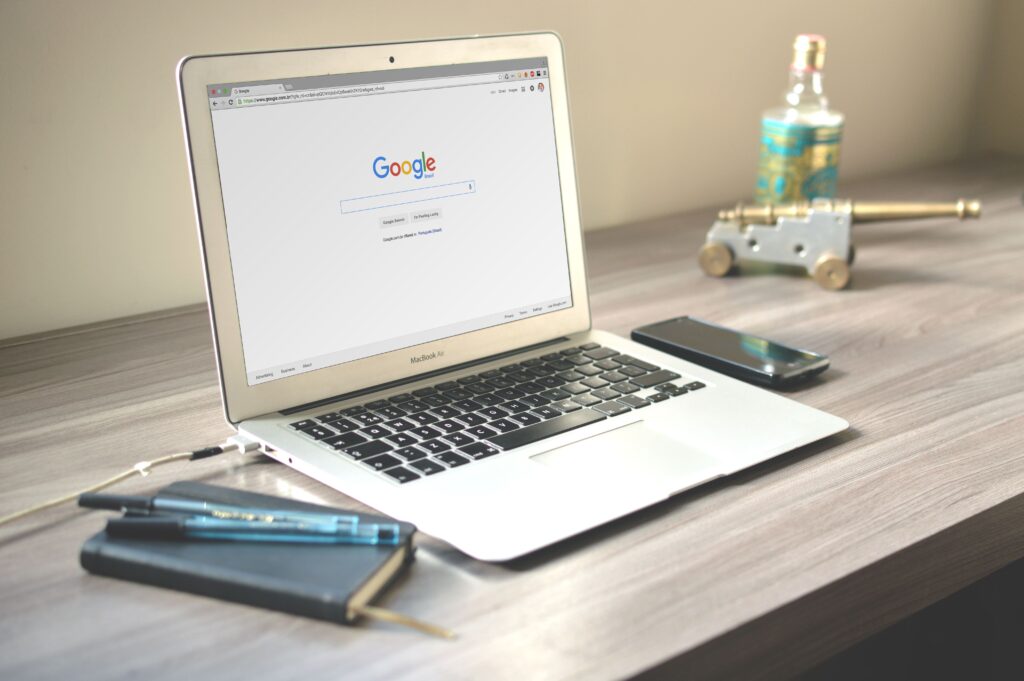 laptop with Google page to represent SEO results by Packerland Websites